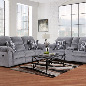 Class and comfort blend in the Kynance Grey Reclining Sofa Set. Plush grey fabric with 100% polyester upholstery adds style and comfort.