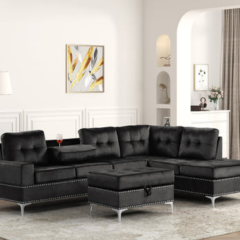 Anserra black velvet reversible sectional with a drop-down cup holders and storage ottoman.