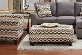 Experience comfortable and stylish lounging with this ottoman from Cosmopolitan Collection.