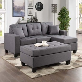 Naomi grey linen button tufted reversible sectional with storage ottoman.