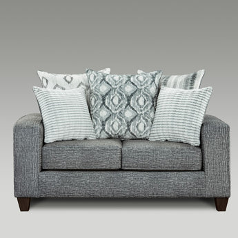 Style & comfort your living room with the Stonewash Charcoal Loveseat. Its modern look mixes patterns and textures. Upholstered in grey fabric. Accent pillows are included.