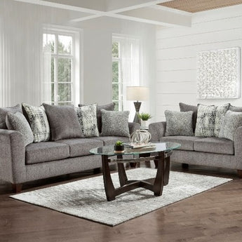 Relax in stylish comfort with the Tori Slate Grey Sofa Set. Its striking grey fabric adds a touch of elegance to any living space for a cozy, comfortable experience