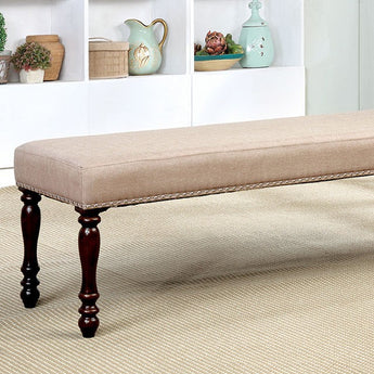 Hurdsfield Bench in Antique Cherry/Beige. The seat is beautifully wrapped with linen-like upholstery, making it the perfect addition to any comfortable dining area!