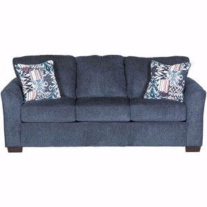 Allure Queen Sleeper Sofa in Navy Blue. This sofa is navy blue in color and comes with decorative throw pillows. Made from 100% polyester fabric. Made in America. Hardwood constructed frame.