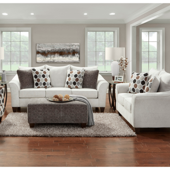 Anna Silver Sofa Collection shows a transitional silhouette, attached back, boxed border seat cushions, gracefully shaped arm, with smooth poly cover with accent pillows. Made in America. Hardwood constructed frame.