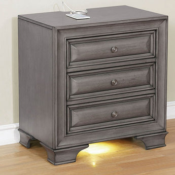 Brandt 3-Drawer Nightstand in Gray finish. This nightstand offers two solutions at once. It is visually stunning and has unrivaled storage space to keep your fabulous new room clutter-free. With three deep drawers, this nightstand can hold clothes, jewelry, and anything else necessary. The gray finish and antique hardware of this piece give it a subtle elegance. USB/Power Outlet in Night Stand