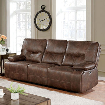 Brown Power Reclining Sofa - Chantoise. Fully upholstered in Fabric-like Vinyl powered with a motor so you can select your own level and angle of comfort.