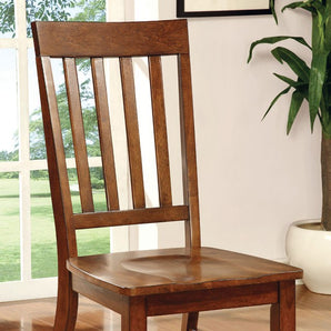 Foster Transitional Side Chair in Dark Oak Finish. A must have dining chair with a counter seat and slatted back design. Made in solid wood and wood veneer.