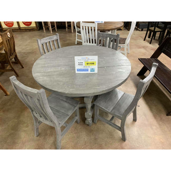 Round Dining 5-PC Set in Grey. It comes with four dining chairs and a round folding table in a grey finish. This set is extremely durable.