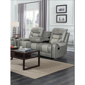 Starwood Grey Reclining Sofa upholstered in a very durable leather with nailhead trim.