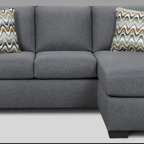Experience the ultimate comfort with this Cosmopolitan Grey Sleeper Sofa. Accent pillows included.