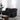 Sink into comfort with the Encore Black Power Reclining Sofa. Air gel leather & pocket coil seating, plus drop-down tray, wireless charger & side power switch for charging.