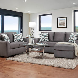 Bring luxury & comfort to your living space with the Fleece Seal Sofa Set. Reversible chaise & grey fabric add an inviting atmosphere.