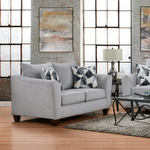 This Herringbone Silver Loveseat features luxurious poly blended fabric upholstery for inviting comfort and ease.
