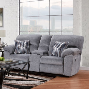 Relax in style with the Kynance Grey Reclining Loveseat. Luxurious grey fabric and 100% polyester with a middle console make this loveseat perfect for your living room.