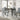 Melshire five-piece dining set with table and four gray upholstered chairs