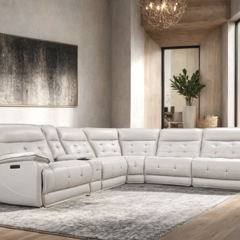 Palma white leather oversized power reclining sectional. It features power headrest, usb charging ports and hidden cup holders.