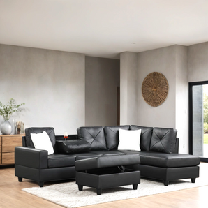 Rocket black leather reversible sectional with drop-down table and storage ottoman.
