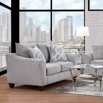 Experience comfort with the Spitfire Ash Loveseat. Crafted with grey fabric upholstery, it offers timeless sophistication.