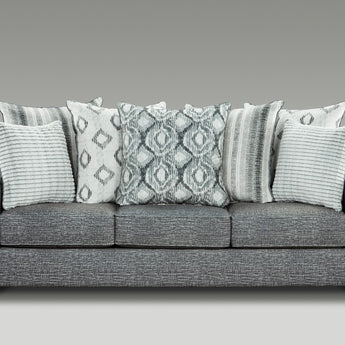 Sink into luxury with the Stonewash Charcoal Sofa! Soft fabric upholstery, accent pillows, modern/relaxed styles, mix of patterns/textures/tones — all giving it a touch of flair.
