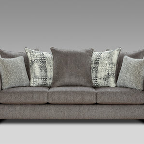 Sink into the plush comfort of the Tori Slate Grey Sofa. Its foam cushioning will cradle you.