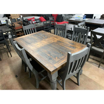 Santa Rita 7pc Rustic Dining Set in Gray/Brown. The Santa Rita Table features beautiful rounded legs and a smooth top while the chair has a tall curved back and a comfortable seat.  The distressed finish adds visible character!
