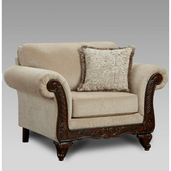 Emma Wheat Chair & 1/2. This chair offers a traditional silhouette with dramatic rolled arms, carved wood feet, and an ornately carved wood front rail.