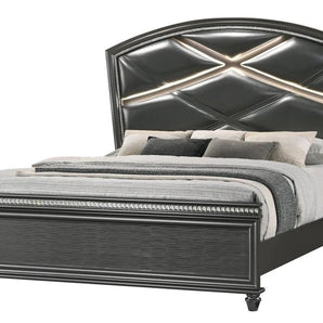 An elegant dark gray bed with upholstered headboard panels. Available in King or Queen size.