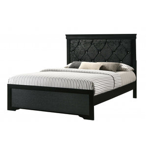 Amalia Black Upholstered Bed. Its upholstered headboard has button tufting details and is durable and easy to clean. Made from hardwood veneers and solids.