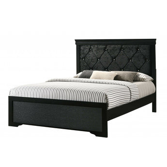 Amalia Black Upholstered Bed. Its upholstered headboard has button tufting details and is durable and easy to clean. Made from hardwood veneers and solids.