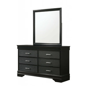 Amalia Black 6-Drawer Dresser. It is finished in a two-tone black with textured black drawer fronts. Features six drawers that open smoothly on ball-bearing glides.