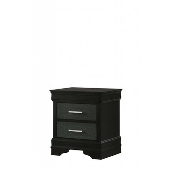 Amalia Nightstand in Black. It is finished in a two-tone black with textured black drawer fronts. It features two drawers decorated with metal handles.