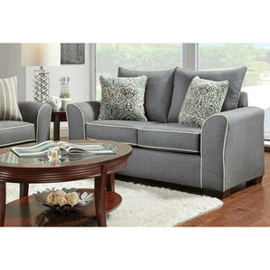 Ashton Graphite Loveseat offers a great modern look to your living room with plush cushions for extra comfort. It features throw pillows to complement the rich upholstery. A matching sofa is also available. 100% Polyester. Made in America. 