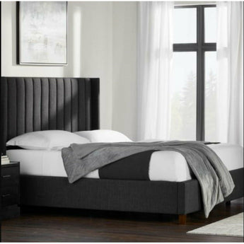 Blackwell Upholstered Bed. This beautiful bed was inspired by art deco design with vertical channels on the headboard. Upholstered in five unique fabrics. Oat, Spruce, Charcoal, Stone, and Desert color. Available in King, Calking, Queen and Full size.