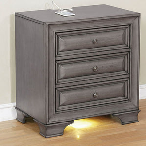 Brandt 3-Drawer Nightstand in Gray finish. This nightstand offers two solutions at once. It is visually stunning and has unrivaled storage space to keep your fabulous new room clutter-free. With three deep drawers, this nightstand can hold clothes, jewelry, and anything else necessary. The gray finish and antique hardware of this piece give it a subtle elegance. USB/Power Outlet in Night Stand