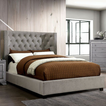 Cayla Upholstered Calking Bed in Gray. This bed features button-tufted headboard with nailhead trim, wingback design and padded flannelette fabric.