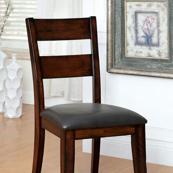 Dickinson Side Chair in dark cherry finish. Bold & sturdy design with padded leatherette seat. Perfect addition to your dining room. 