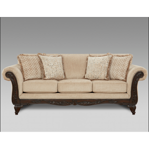 Emma Wheat Sofa features rolled arms, carved wood feet, and lavishly carved wood front rail. A matching loveseat is available.