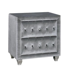 Alzir Button Tufted Nightstand in Grey. Comforting cushioned velvet-like fabric encompasses this chic nightstand. It has two storage drawers and cabriole feet.