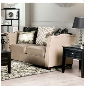 Hampden Beige Loveseat. This loveseat is truly unique in its use of camelback armrests. The nailheads dot along with the trim and accentuate the rolling hills of the design. 