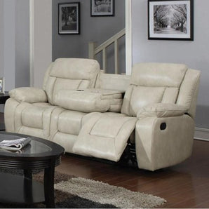 Hudson Beige Reclining Sofa.  It features a sectioned back with a defined headrest, a pad-over-chaise made of memory foam for added comfort and pillow arms. It is adorned with beautiful brown contrast stitching accents. It also features a center drop-down table with two cup holders.