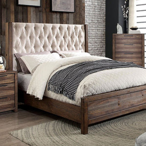 Hutchinson CalKing Bed in Rustic Natural Tone. Diamond tufting can be found all along the fabric upholstered wingback style headboard while the wood grain emphasizes the natural finish.