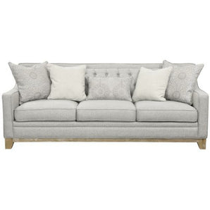 Jaizel Grey Sofa. . The neutral, sophisticated Jaizel sofa layers classic button tufting, textured and patterned fabrics, weathered woods, and clean lines to bring you a comfortable, enchanting look that pairs just as effortlessly in a formal living room