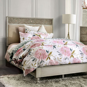 Jakarta Bed in Antique White. The bed features a luxurious padded headboard and sturdy frame.  An antique white finish and turned legs complete the transitional look!