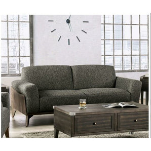 Kloten Gray Sofa. Brown leatherette covers the back and base of the piece, contrasted with gray fabric on the seat, arms, and backrest.