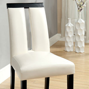 Luminar Dining Chair in Black and White color. Beautifully crafted side chair with padded leatherette seats. Slit back design. Includes 2 pieces per box. Complete your dining room with its matching Luminar dining table.