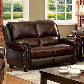 Turton Loveseat in Brown. Rolled arms come adorned with nailhead trim, which stylishly pops against the brown coloring.