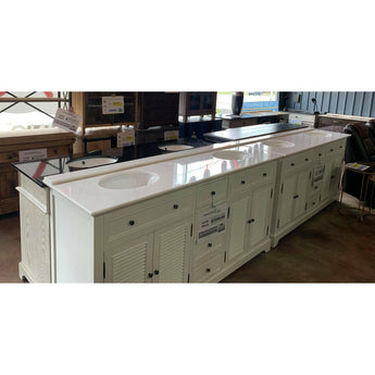 Double Vanity Sink in White. It features shutter doors that open up to a large compartment for your towels, toiletries, and other essentials. This vanity set offers an effortless look that will create a relaxing and picturesque retreat in any bathroom. Features 6 drawers, 2 undermount basin and 4 shutter door cabinet.