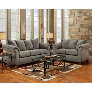 Relax and enjoy your special moments together with the Sensations Grey Sofa and Loveseat. Plenty of modern seating for all your cozy-get togethers.