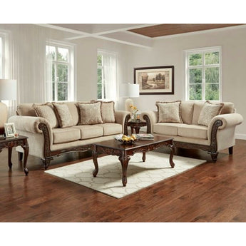 Emma Wheat  Sofa and Loveseat features rolled arms, carved wood feet, and lavishly carved wood front rail. Accent pillows included. 
